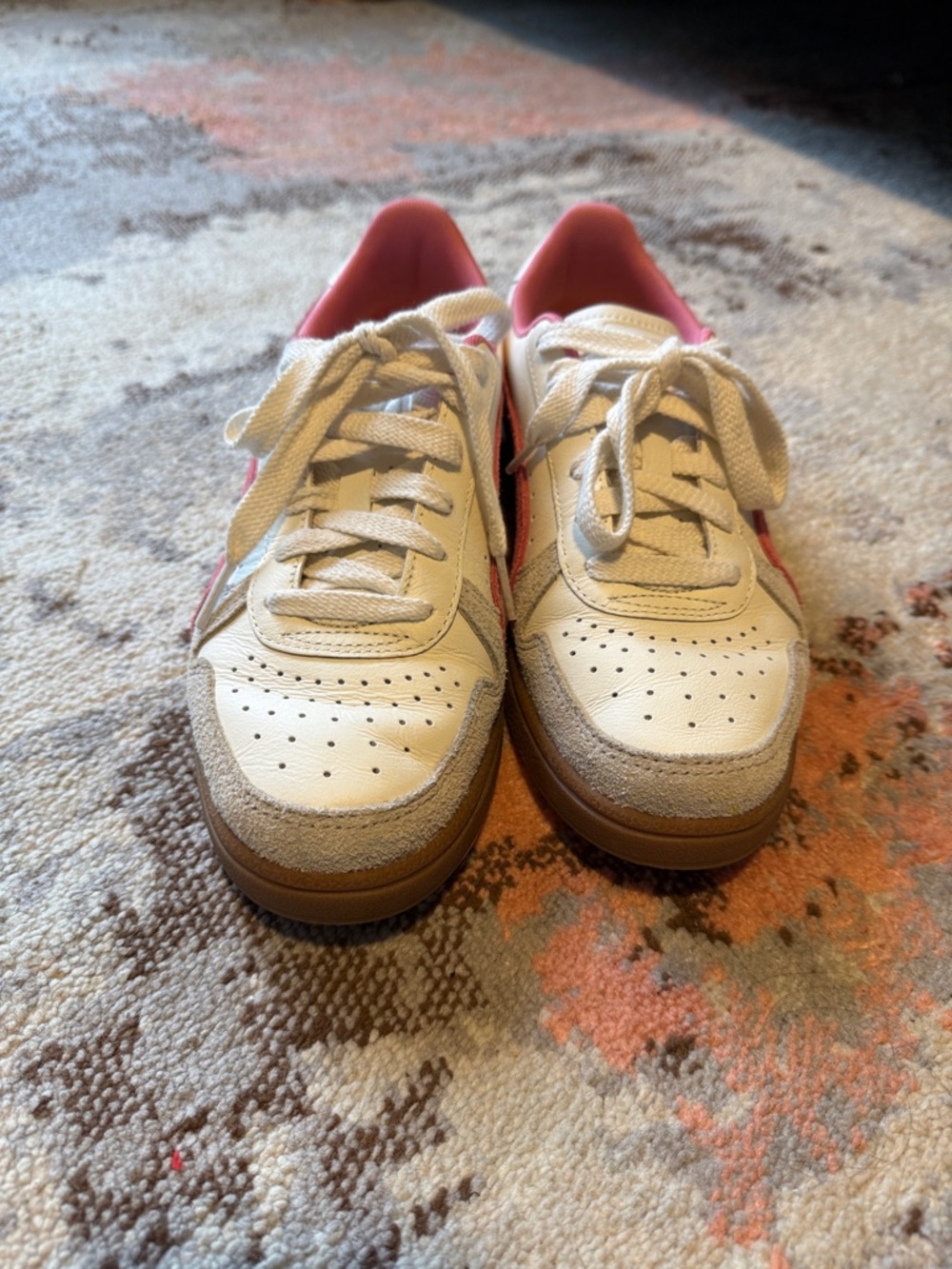 Puma Court with pink accents. Women’s 8.5